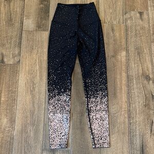 Beyond Yoga Black and Metallic Pink Leggings